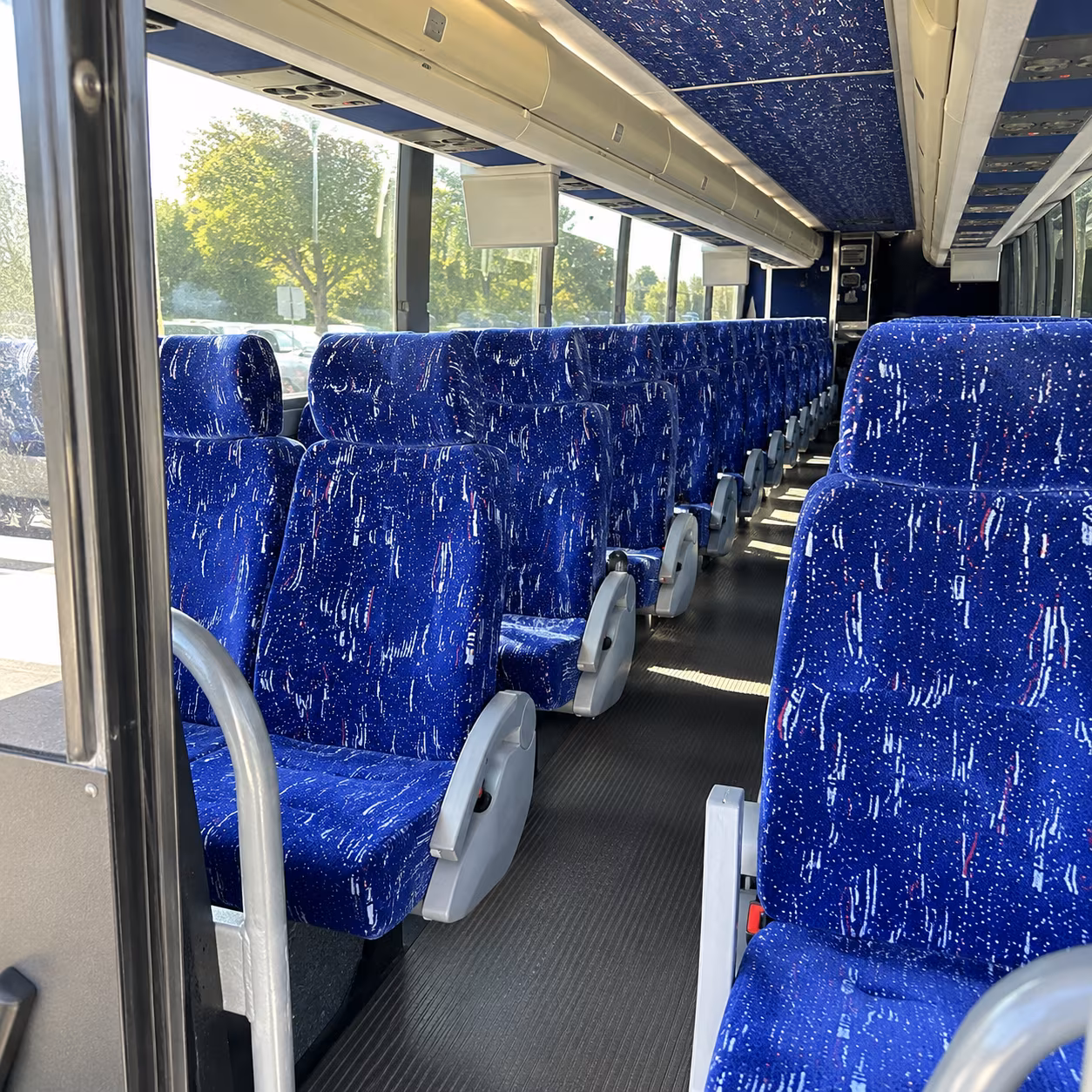 austin 50 passenger charter bus inside