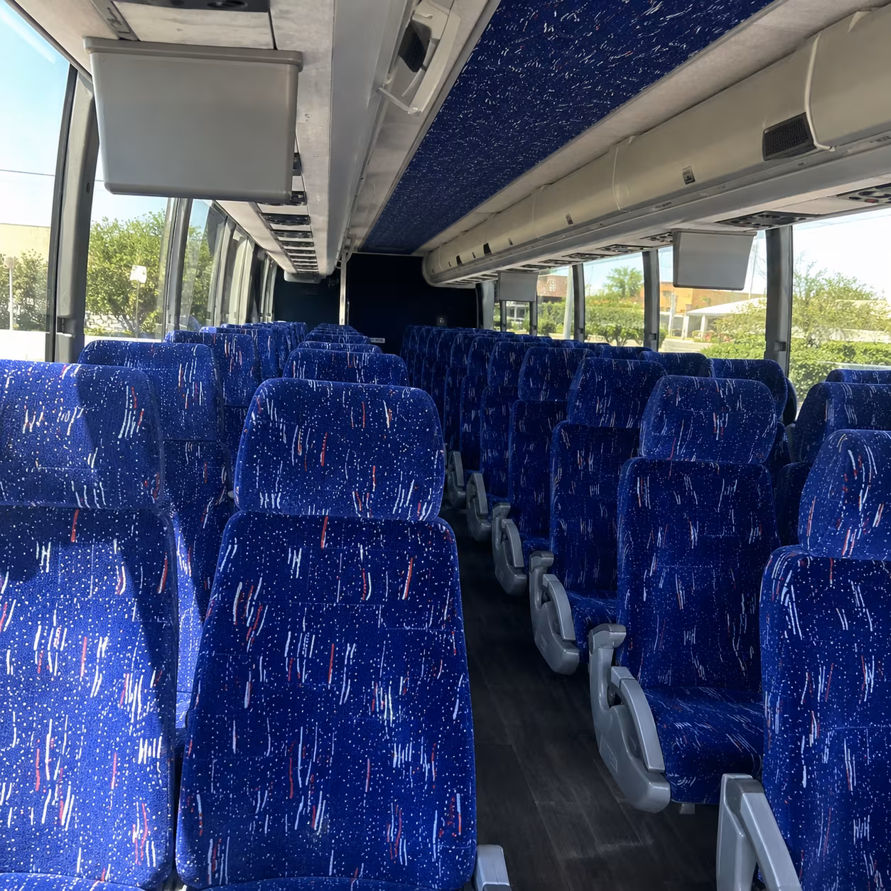 charter buses for large austin prom groups heading to hotel ballrooms and event centers
